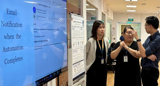 Photo credit Artificial Intelligence & Automation, Future Health System, Singapore General Hospital    (From left) SGH RPA Citizen Developer and Accountant Karen Tay showcasing her automation project at the SGH RPA Showcase 2024 to her colleagues from Finance and the outpatient team.      