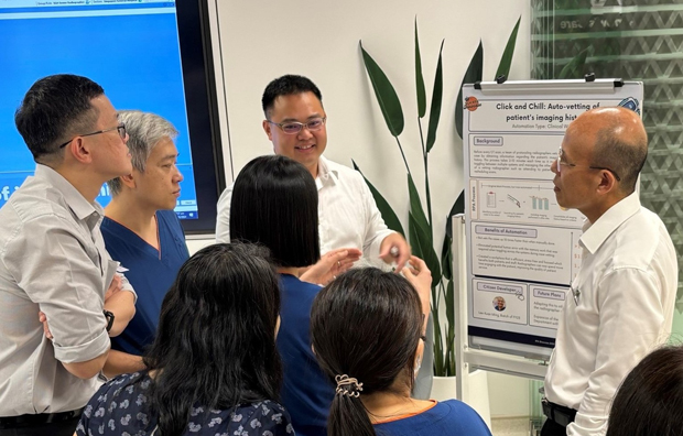 ​RPA Citizen Developer and Senior Radiographer Lee Kuan-Ming showcasing his RPA use case at the SGH RPA Showcase 2024.  Photo credit Artificial Intelligence & Automation, Future Health System, Singapore General Hospital 