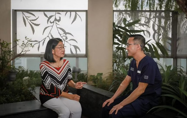  ​Dr Chua Horng Ruey, an expert in kidney disease at NUH, with his patient, Madam Chow Yow Leng, who is benefitting from the newer treatment. ST PHOTO GAVIN FOO 
